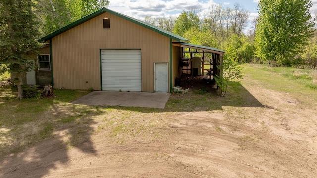 33507 Old 371, Pequot Lakes, MN 56472 - garage featuring driveway and a garage