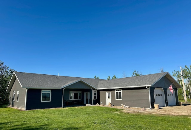 31526 270th St, Badger, MN 56714 - ranch-style house featuring a front lawn, an attached garage, driveway, and roof with shingles