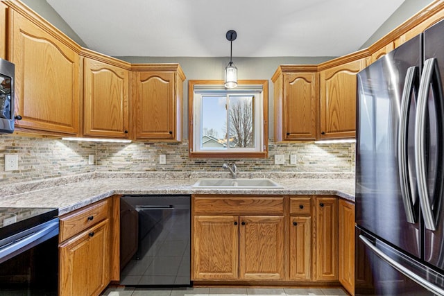 kitchen featuring stainless steel appliances, a sink, backsplash, lofted ceiling, and light tile patterned floors