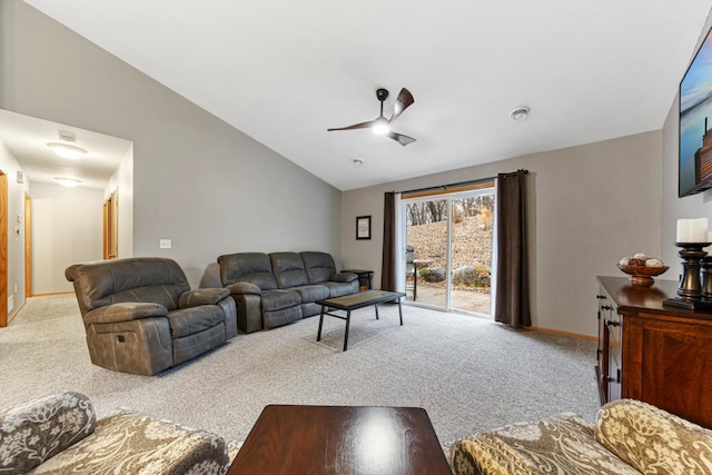 living area with lofted ceiling, baseboards, a ceiling fan, and carpet flooring