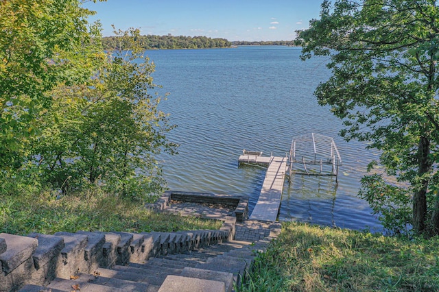view of dock with a water view