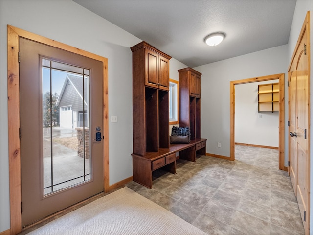 mudroom featuring baseboards
