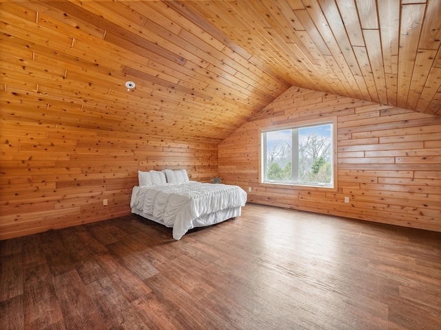 bedroom featuring wooden walls, wood finished floors, lofted ceiling, and wooden ceiling