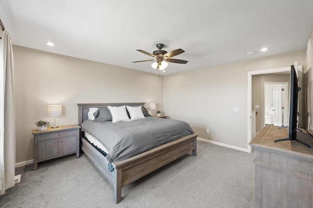 bedroom featuring light colored carpet, baseboards, recessed lighting, and ceiling fan
