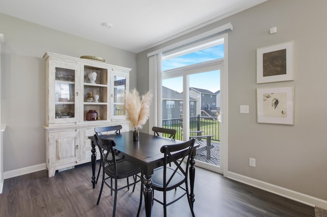 3459 109th Ln NE, Blaine, MN 55449 - dining room with baseboards and dark wood-style floors