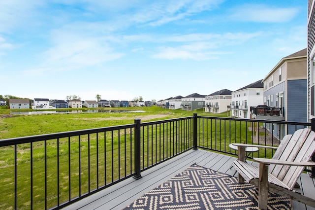 3459 109th Ln NE, Blaine, MN 55449 - wooden deck featuring a residential view and a lawn