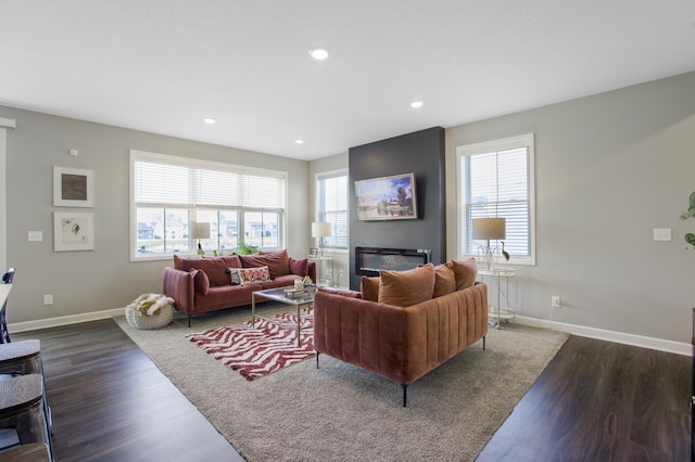 3459 109th Ln NE, Blaine, MN 55449 - living area with plenty of natural light, wood finished floors, baseboards, and recessed lighting