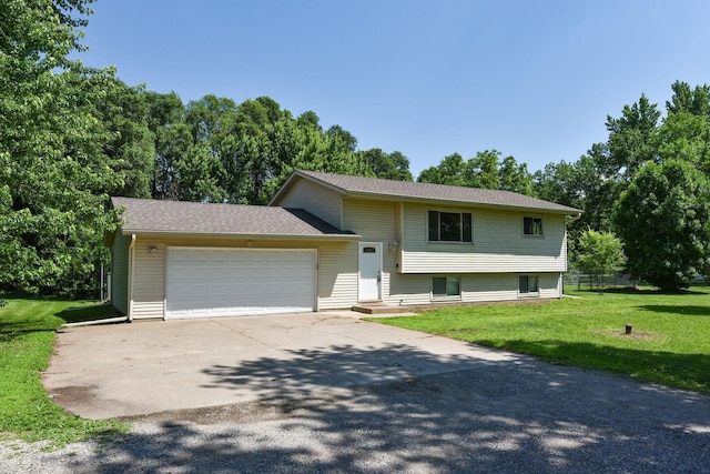 15320 90th St NE, Otsego, MN 55330 - view of front of house featuring a front lawn, a garage, and concrete driveway