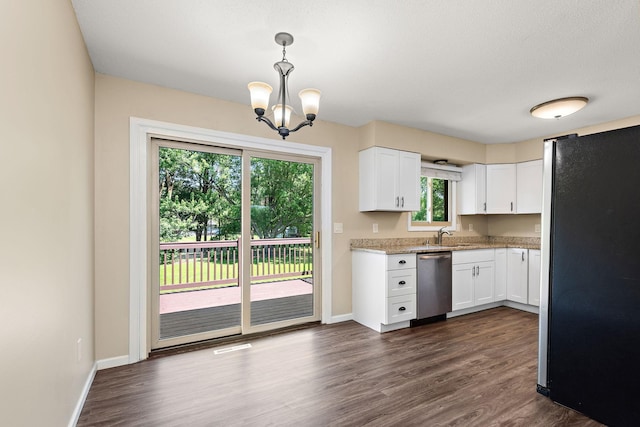 15320 90th St NE, Otsego, MN 55330 - kitchen featuring appliances with stainless steel finishes, white cabinets, a chandelier, and plenty of natural light
