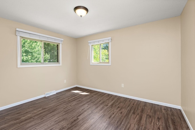 15320 90th St NE, Otsego, MN 55330 - empty room with baseboards and dark wood-style floors
