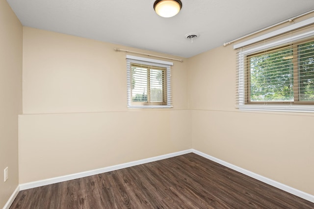 15320 90th St NE, Otsego, MN 55330 - unfurnished room featuring dark wood-style flooring and plenty of natural light