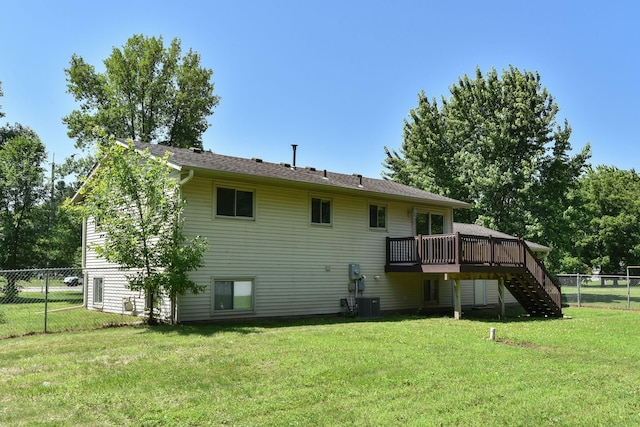 15320 90th St NE, Otsego, MN 55330 - back of house with stairway, a fenced backyard, and a deck