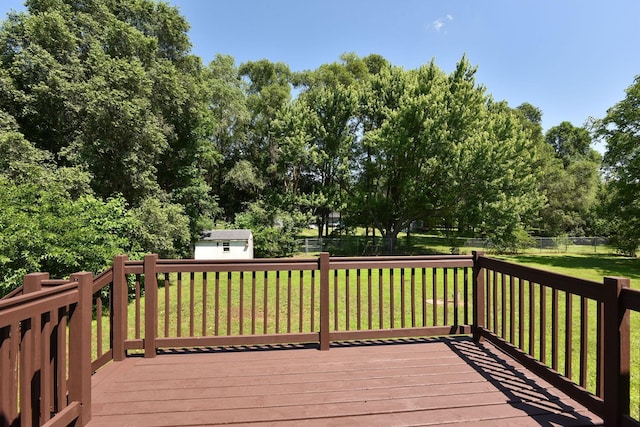 15320 90th St NE, Otsego, MN 55330 - wooden deck with a fenced backyard, a storage shed, and view of scattered trees