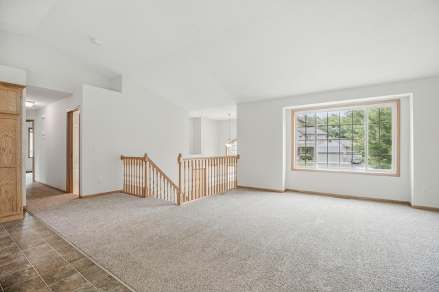 10310 Kaitlin Ave, Hanover, MN 55341 - carpeted spare room featuring lofted ceiling and baseboards
