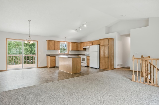 10310 Kaitlin Ave, Hanover, MN 55341 - kitchen with white appliances, open floor plan, a kitchen island, baseboards, and lofted ceiling