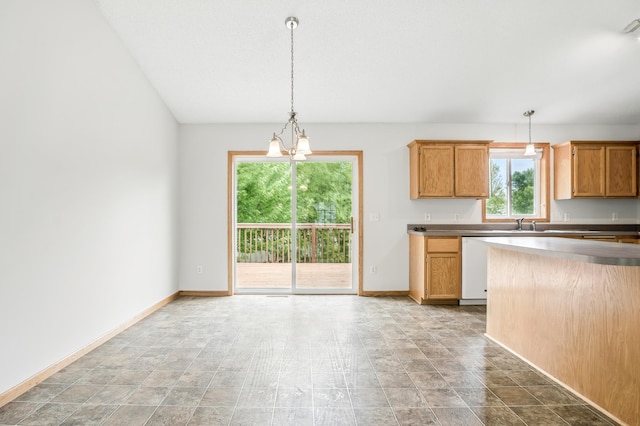 10310 Kaitlin Ave, Hanover, MN 55341 - kitchen featuring decorative light fixtures, baseboards, a chandelier, and stone finish flooring