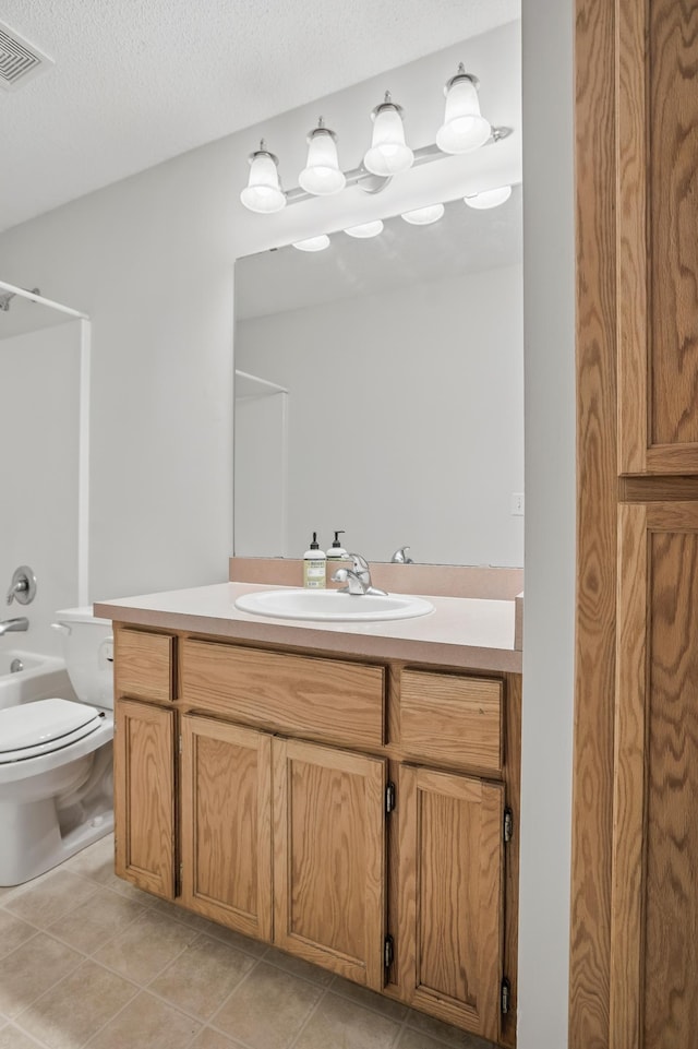 10310 Kaitlin Ave, Hanover, MN 55341 - bathroom with vanity, shower / bathtub combination, toilet, and tile patterned floors
