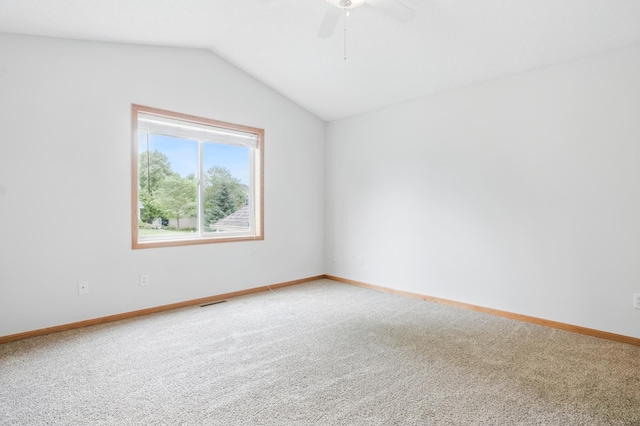 10310 Kaitlin Ave, Hanover, MN 55341 - unfurnished room featuring carpet, lofted ceiling, ceiling fan, and baseboards