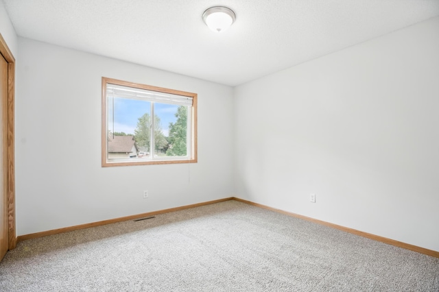 10310 Kaitlin Ave, Hanover, MN 55341 - carpeted spare room with baseboards