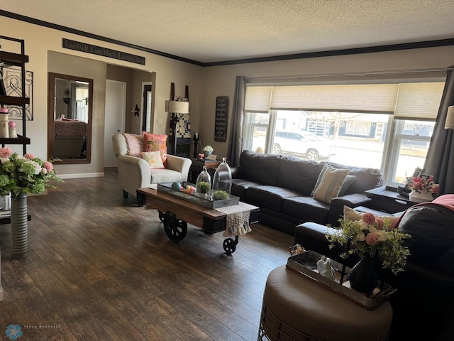 living room with crown molding, baseboards, a textured ceiling, and dark wood-style floors
