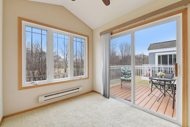 doorway to outside featuring plenty of natural light, a baseboard heating unit, baseboards, and ceiling fan