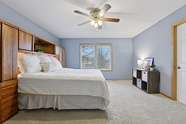 bedroom featuring a ceiling fan and carpet floors