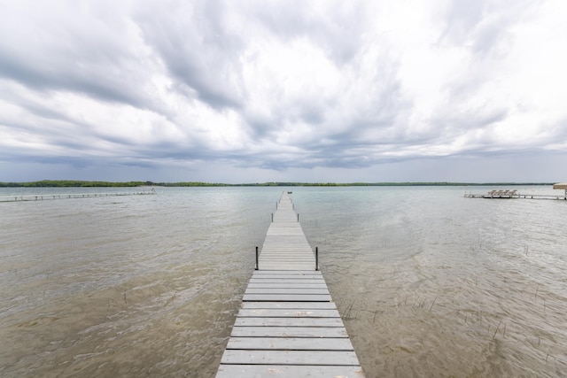 view of dock with a water view