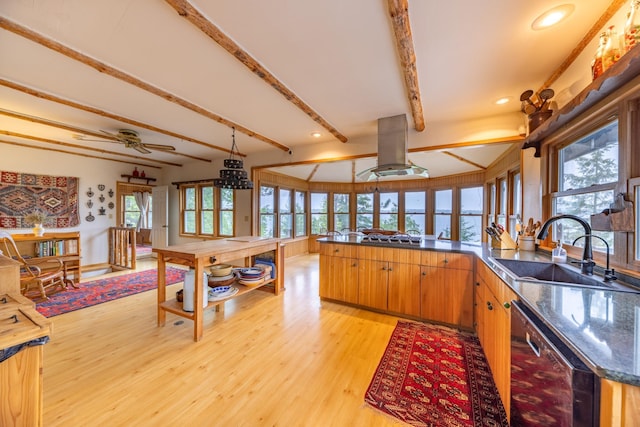 kitchen with dishwashing machine, light wood-type flooring, island exhaust hood, a sink, and beam ceiling