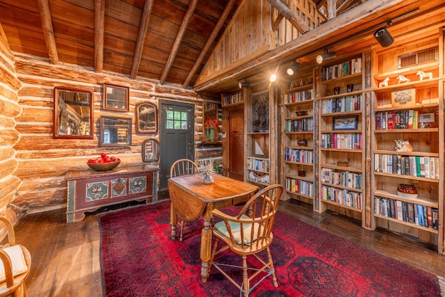 interior space featuring high vaulted ceiling, hardwood / wood-style floors, wooden ceiling, and beam ceiling