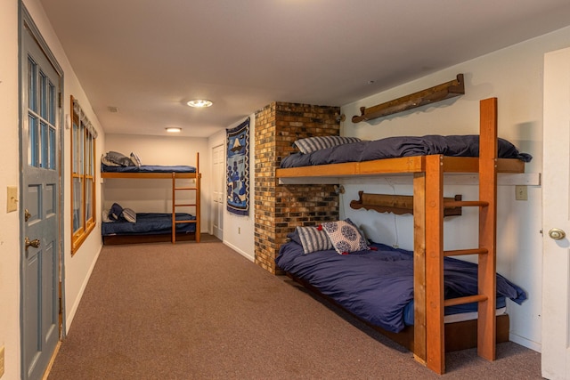carpeted bedroom with baseboards