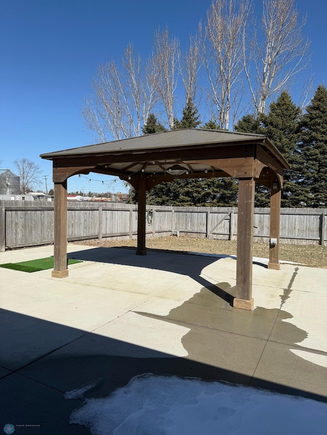 view of patio / terrace featuring a gazebo and a fenced backyard