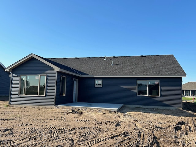 212 Woolgrass Way, Avon, MN 56310 - back of property featuring a patio area and roof with shingles