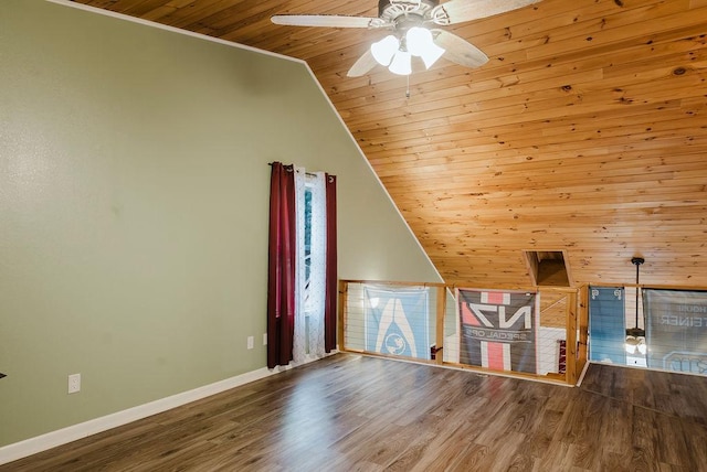 additional living space featuring ceiling fan, baseboards, wood finished floors, lofted ceiling, and wood ceiling