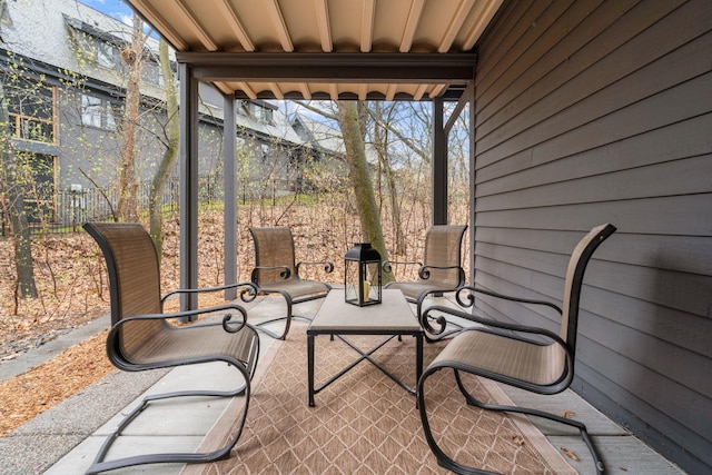 view of patio featuring fence