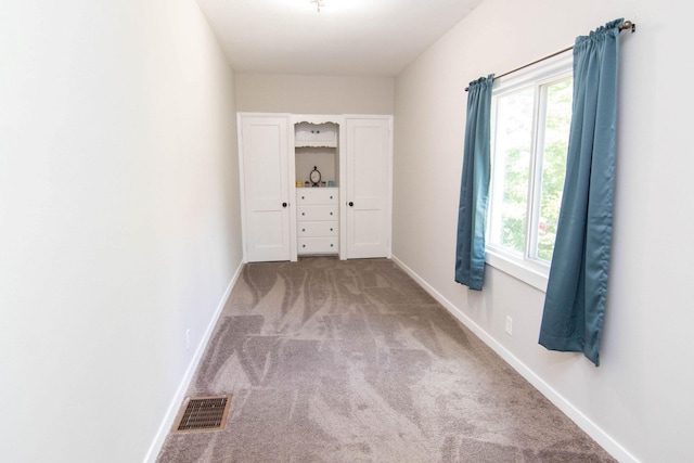217 Center St, Mankato, MN 56001 - carpeted empty room featuring baseboards and visible vents