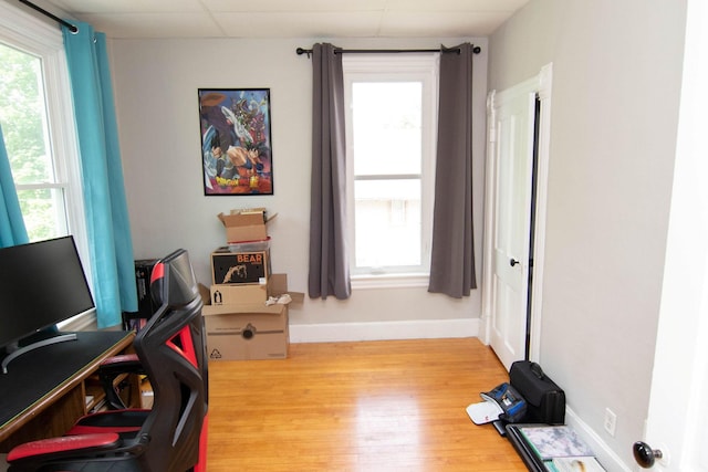 217 Center St, Mankato, MN 56001 - office area featuring light wood-type flooring and baseboards