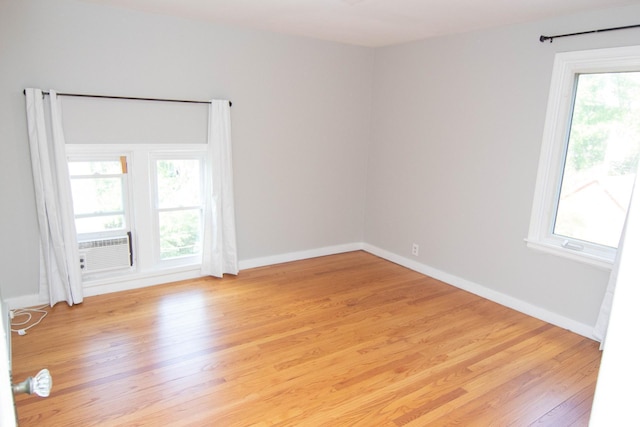 217 Center St, Mankato, MN 56001 - spare room featuring light wood-type flooring and baseboards