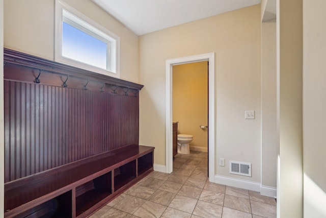 mudroom with visible vents and baseboards