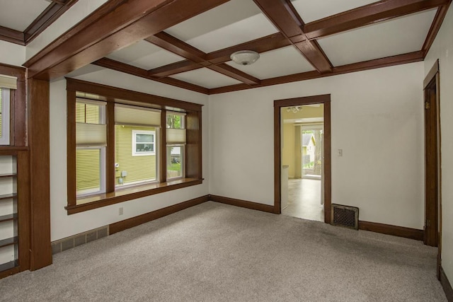 509 Nicollet Ave, North Mankato, MN 56003 - carpeted spare room featuring healthy amount of natural light, coffered ceiling, beam ceiling, and baseboards