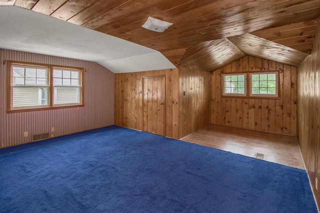 509 Nicollet Ave, North Mankato, MN 56003 - bonus room featuring lofted ceiling, wooden walls, and wood ceiling