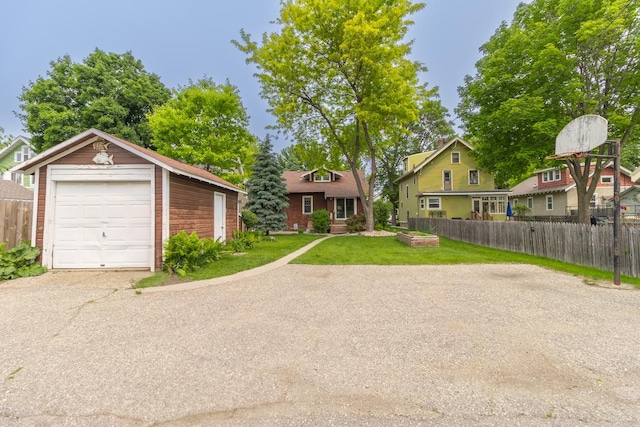 509 Nicollet Ave, North Mankato, MN 56003 - view of front of property featuring an outbuilding, driveway, a garage, and a residential view