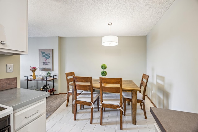 210 Grant St Unit 710, Minneapolis, MN 55403 - dining room featuring a textured ceiling