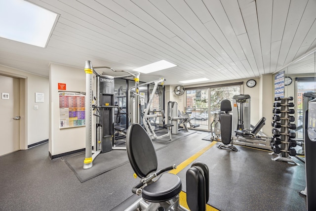 210 Grant St Unit 710, Minneapolis, MN 55403 - gym with a skylight and wooden ceiling