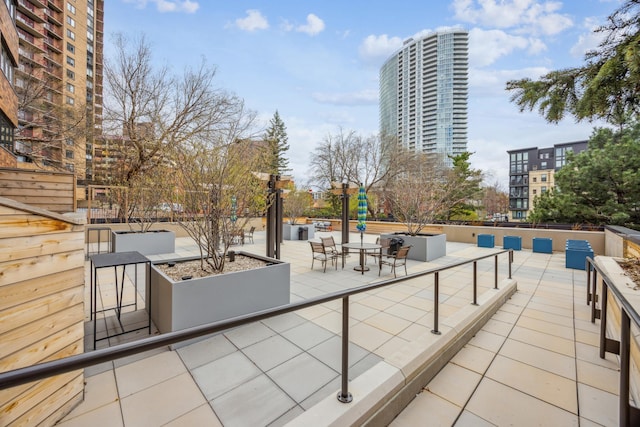 210 Grant St Unit 710, Minneapolis, MN 55403 - view of patio with a city view