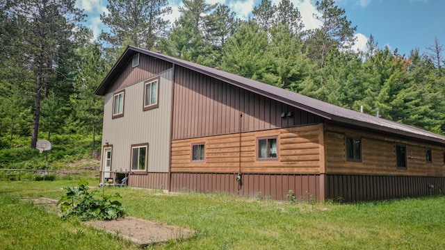 5242 Cusson Loop Rd, Leiding Twp, MN 55771 - view of side of property with a yard