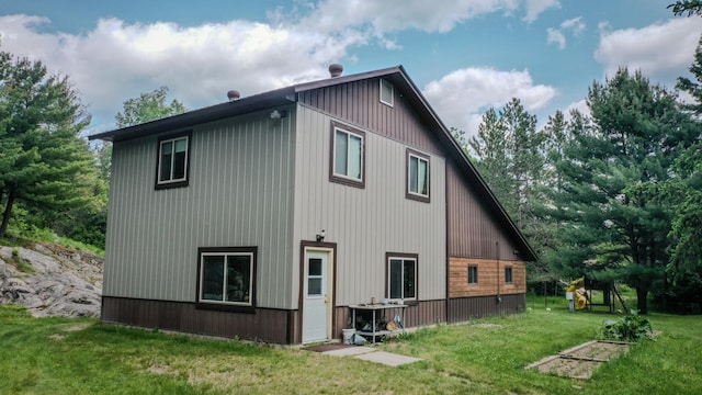 5242 Cusson Loop Rd, Leiding Twp, MN 55771 - view of home's exterior featuring a yard
