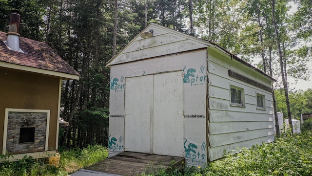 5242 Cusson Loop Rd, Leiding Twp, MN 55771 - view of shed featuring view of scattered trees