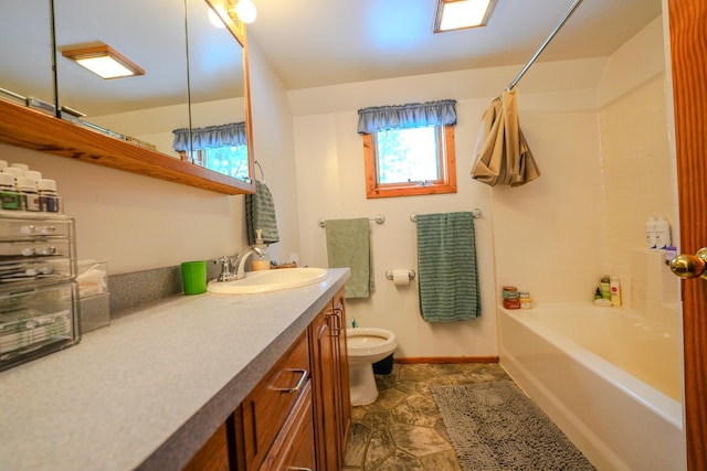 5242 Cusson Loop Rd, Leiding Twp, MN 55771 - full bathroom featuring healthy amount of natural light, vanity, and tub / shower combination