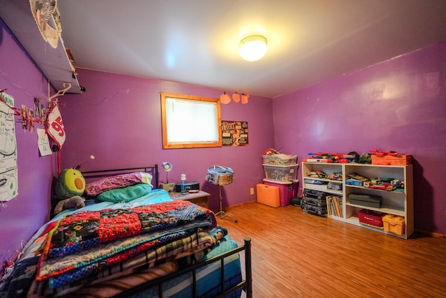 5242 Cusson Loop Rd, Leiding Twp, MN 55771 - bedroom with wood finished floors