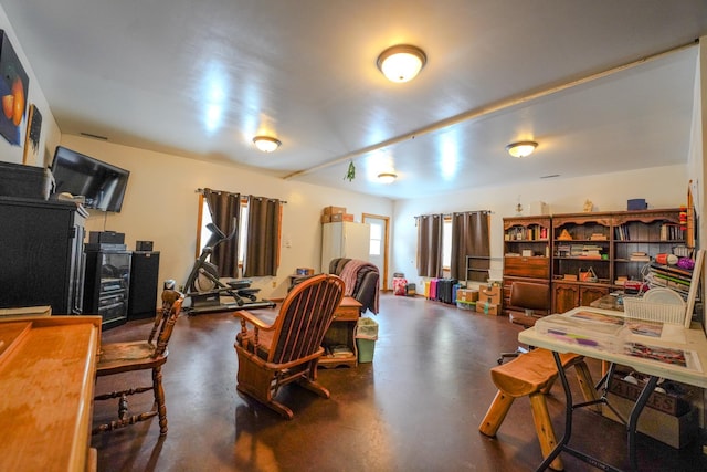 5242 Cusson Loop Rd, Leiding Twp, MN 55771 - living room featuring finished concrete floors